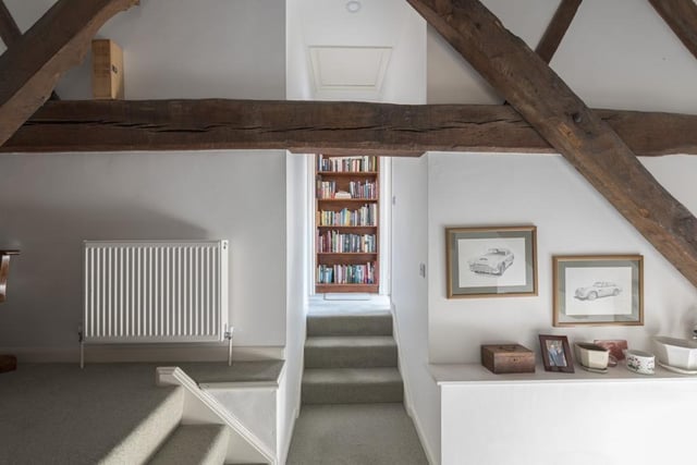 The property offers  features a landing with study/sitting area and exposed character beams