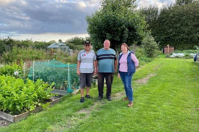 Cllr Bailey pictured with members of the allotment association
