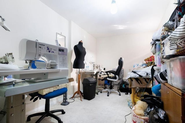 Another bedroom is used as a sewing room