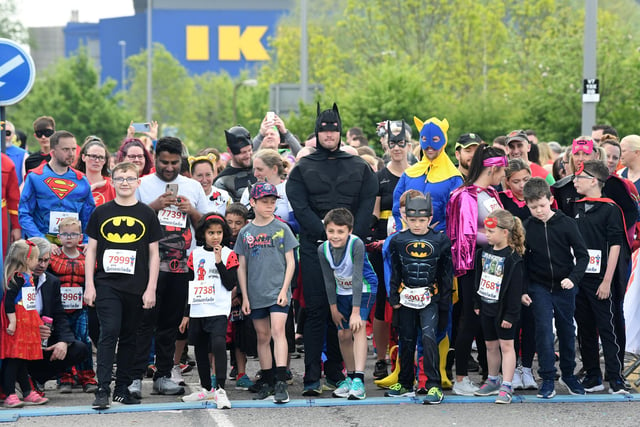 Superheroes line up for the race