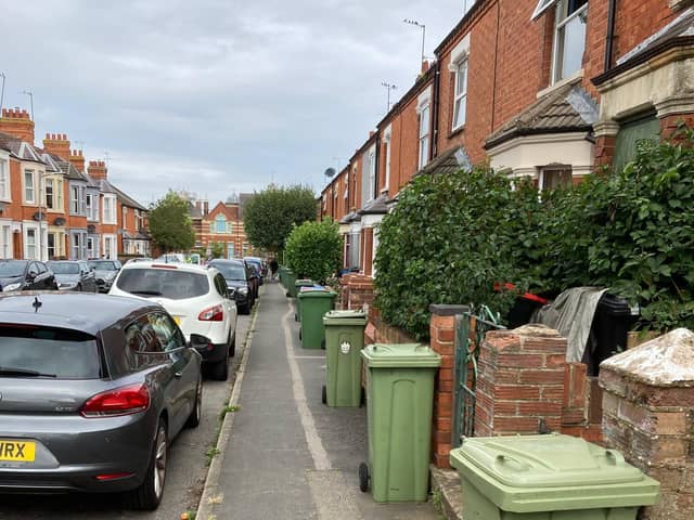 These green bins in Wolverton have not been emptied for two and a half weeks and they are now smelly nd maggot infested