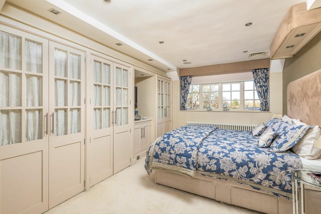 The master and (second bedrooms) each cover the full depth of the house, and each feature ample fitted wardrobes.