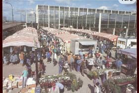This photo, taken in the 1980s, shows CMK outdoor market, bustling with shoppers