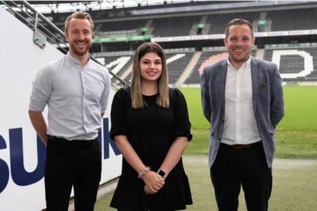 Lucy with her colleagues from MK Dons