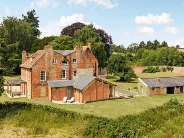 Multiple terraced seating areas are spread across the grounds, and there is also an orchard which comes with a wooded seating area. Photo: Fisher German LLP - South/ Zoopla