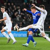 Conor Grant battles with Harvey Barnes during the defeat to Leicester City