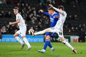 Conor Grant battles with Harvey Barnes during the defeat to Leicester City