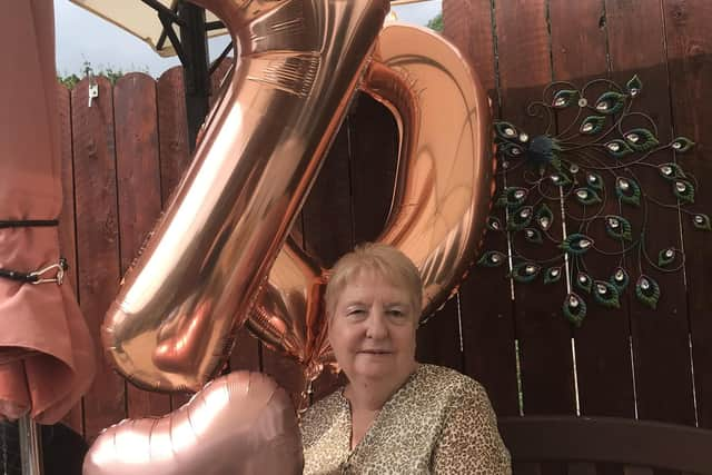 Patricia Mulholland, pictured at her 70th birthday celebration, was a much loved wife and mother