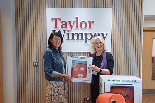 Taylor Wimpey South Midlands donates three defibrillators to Community Heartbeat Trust