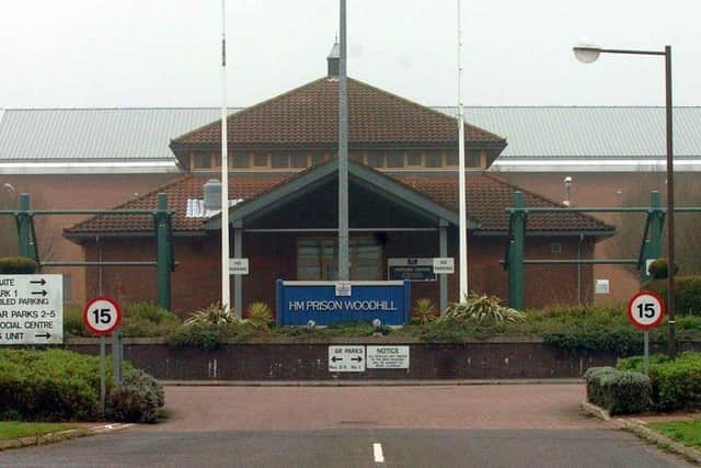 A man was jailed for helping to smuggle drugs into Woodhill Prison, above