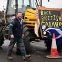 One of the messages sent to the Government at a protest in Milton Keynes this morning. (Photo by Leon Neal - WPA Pool/Getty Images)