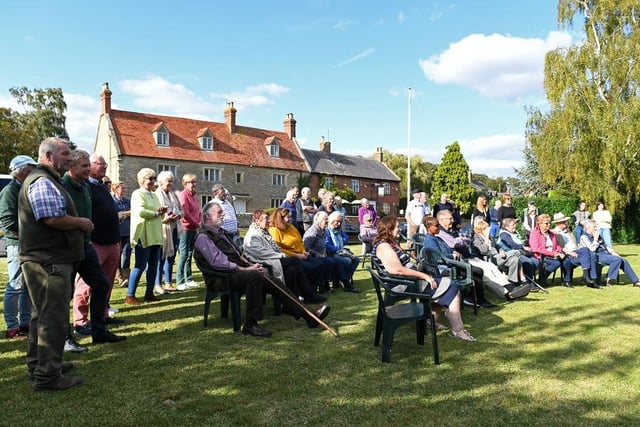 Weston Underwood villagers gather on the village green for the presentation