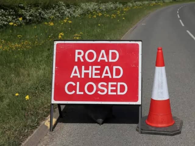 Road Closed Ahead Sign