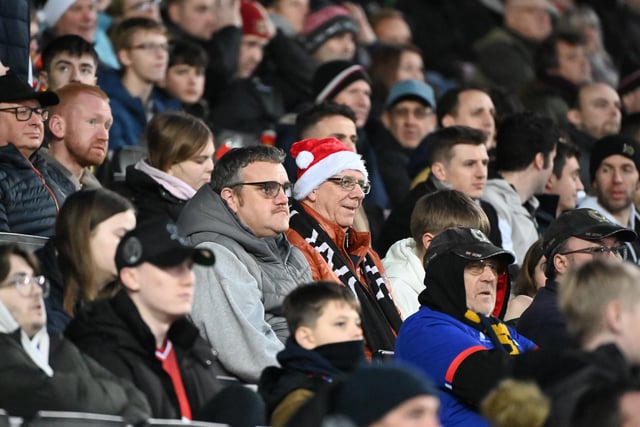 Fans in the stands on Boxing Day at Stadium MK