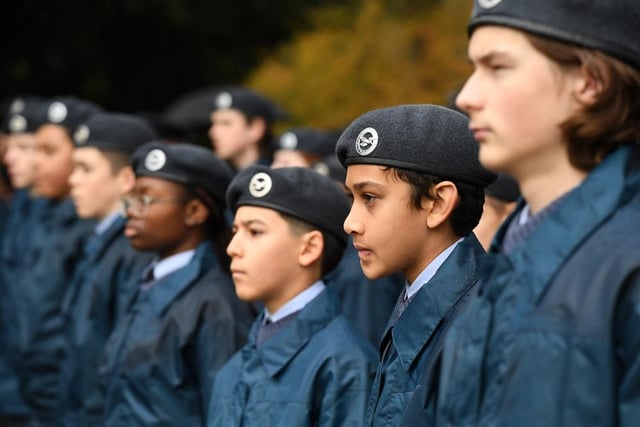 Serious young faces on Remembrance Day in Milton Keynes