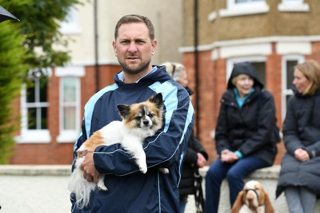 This man's best friend found the carnival fun all a bit exhausting
