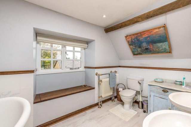The  main bathroom has been refitted to reflect the romantic regency era, with a feature roll-top freestanding clawfoot bath