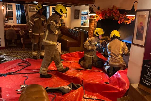 Firefighters worked quickly to prevent a blaze at The Crooked Billet pub in Newton Longville spreading to its thatched roof