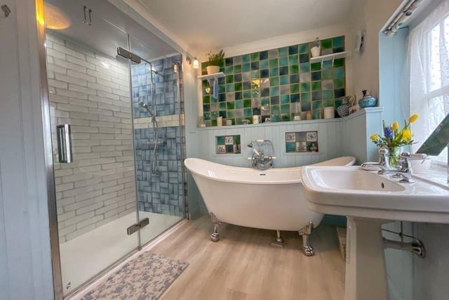 This stylish cottage exudes numerous benefits and features including a contemporary bath/shower room