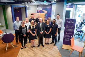 Bruce Fletcher, NatWest group chief risk officer (centre), meets staff from the new Milton Keynes banking hub