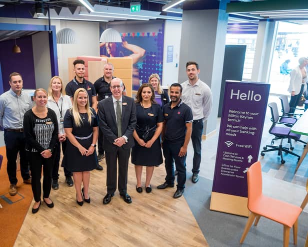 Bruce Fletcher, NatWest group chief risk officer (centre), meets staff from the new Milton Keynes banking hub