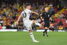 Darragh Burns fires in Dons' second goal against Watford in their 2-0 Carabao Cup win on Tuesday night