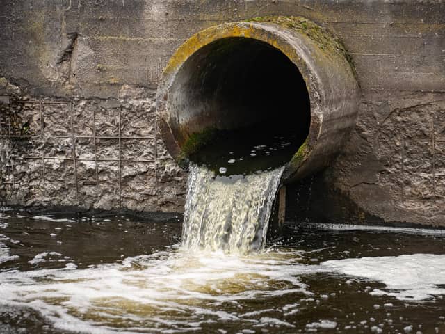 Dirty water flows from a sewage pipe into a river. This happened dozens of times last year in Milton Keynes.