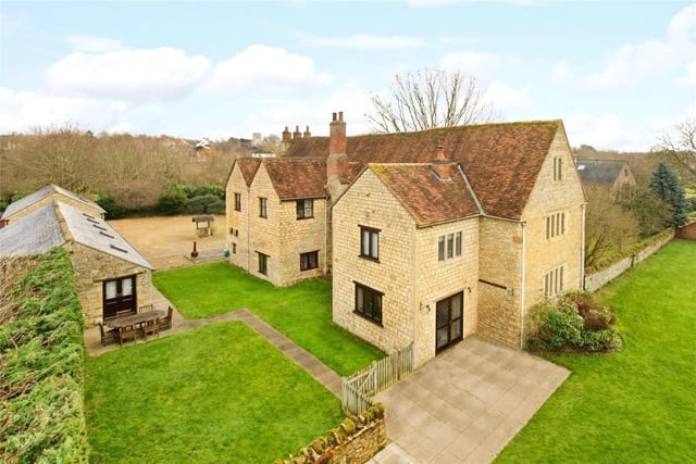 The Grade I1 listed 16th century six bedroom manor house sits in  grounds of approximately 1.25 acres