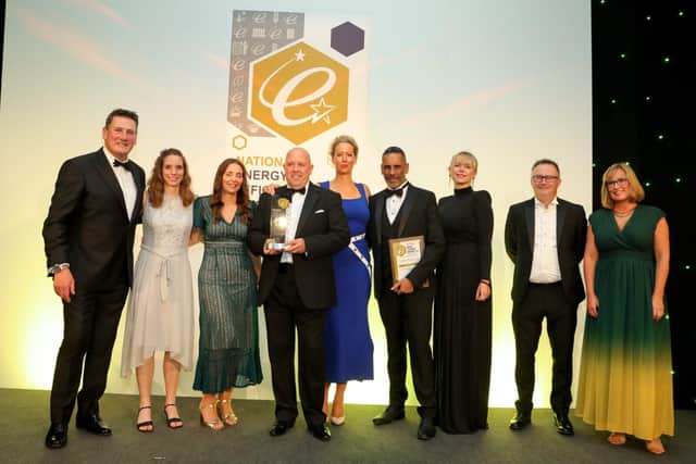 Awards presenter Tony Hadley with the WATMOS team