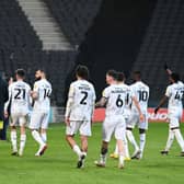 MK Dons will be looking to make it four wins in a row on Saturday when they take on Wycombe Wanderers at Adams Park