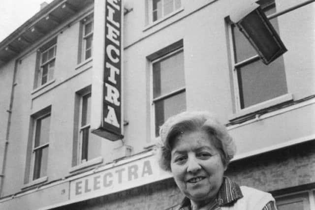 Miss Salmons outside the old Electra cinema in Newport Pagnell