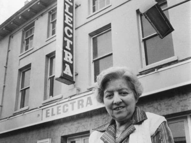Miss Salmons outside the old Electra cinema in Newport Pagnell