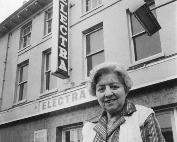 Miss Salmons outside the old Electra cinema in Newport Pagnell