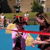 Cllr Emily Darlington and Bella open the pirate play park on the Lakes Estate