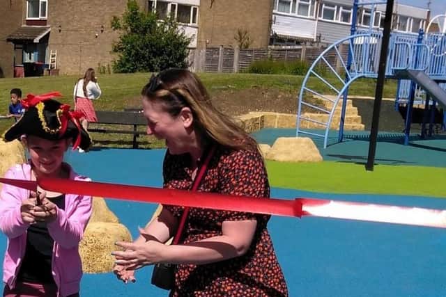 Cllr Emily Darlington and Bella open the pirate play park on the Lakes Estate
