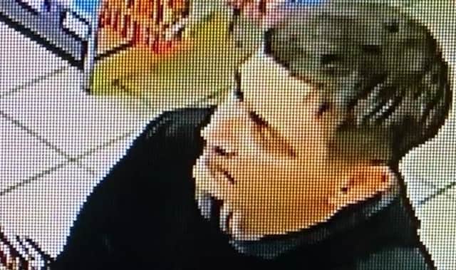 Do you recognise this man? Police want to speak to him about a theft from a woman in Milton Keynes