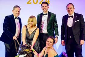 Team Pickles Collecting a National SME award a Pickle customers PTSD service dog, powered by their premium food range.