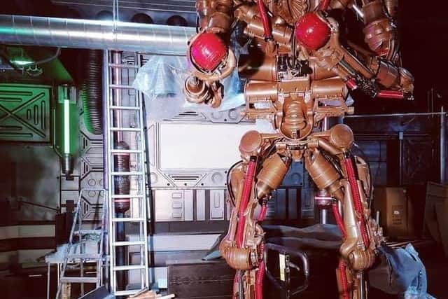 A 10ft tall 'Mike Dyson' robot was one of the many sci-fi features admired by customers