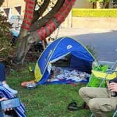 Protestors have been camping out for days under a horse chestnut tree in Newport Pagnell to stop contractors from felling it