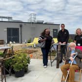 Councillors visit the green roof on the YMCA building at Central Milton Keynes