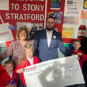 Youngsters at Deanshanger Primary School celebrate their cash gift