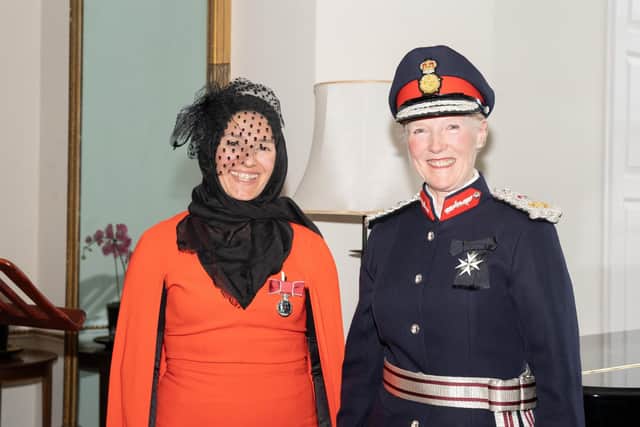 Khadijah Safari received her medal from the Countess Howe