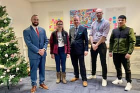 Cllr Joe Hearnshaw, cabinet member for children and young people (left) with Mac Heath, director of children’s services (centre) young people and staff at the Care Leavers Hub