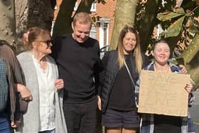 The protestors pictured after their victory in saving two mature trees from being chopped down in Newport Pagnell today