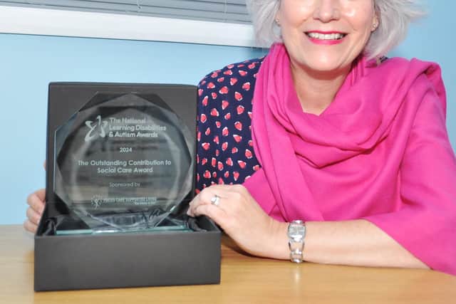 Angela Novell with her award