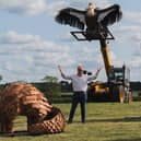 Joe pictured with some of the sculptures