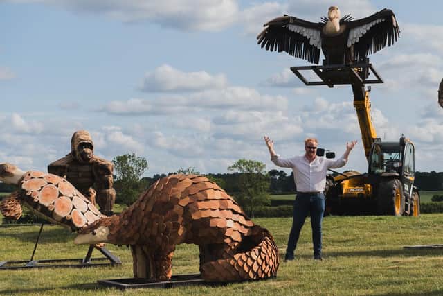 Joe pictured with some of the sculptures