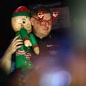 Ricky Evans got the Ally Pally crowd in the festive spirit with his walk-on