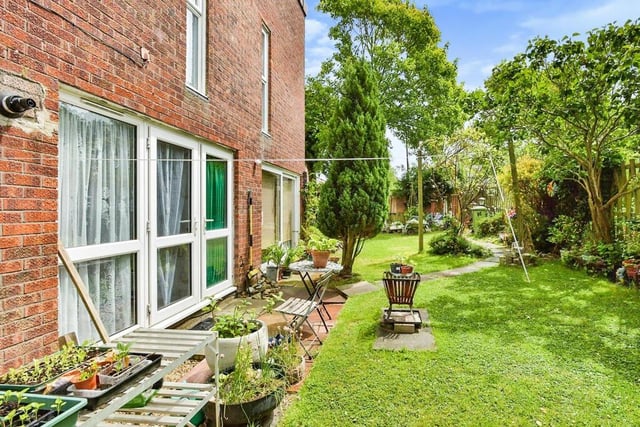 The L-shaped rear garden is a good size, say the estate agents