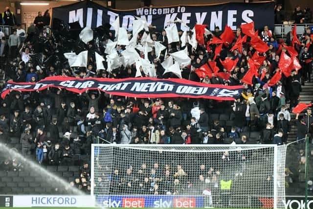 An MK Dons fan faced a ban at the end of last season